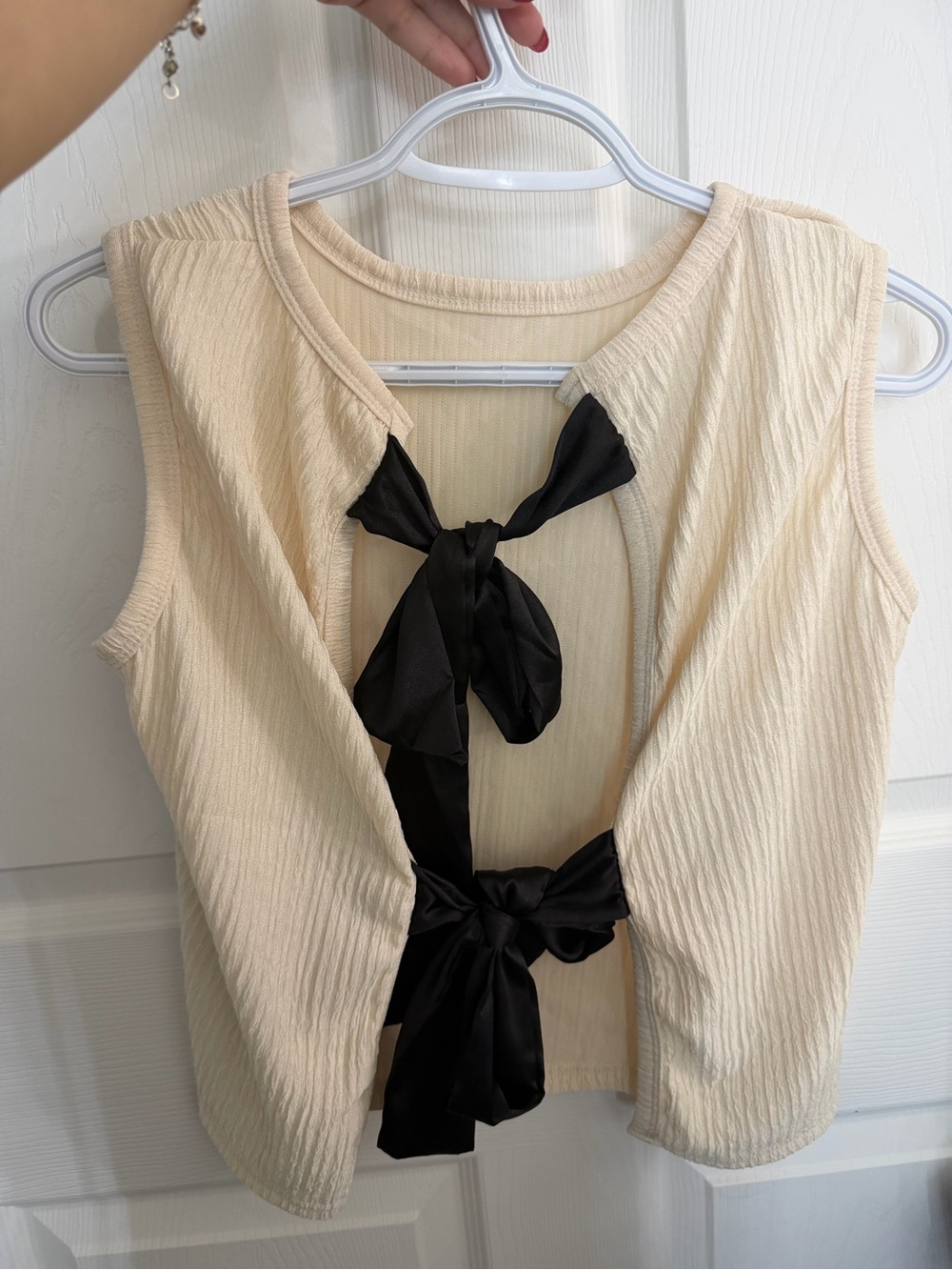 Cream Sleeveless Tank Top with Black Bow-Back Detail